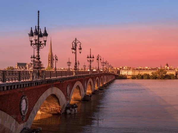 Bordeaux Pont de Pierre bridge at sunset
